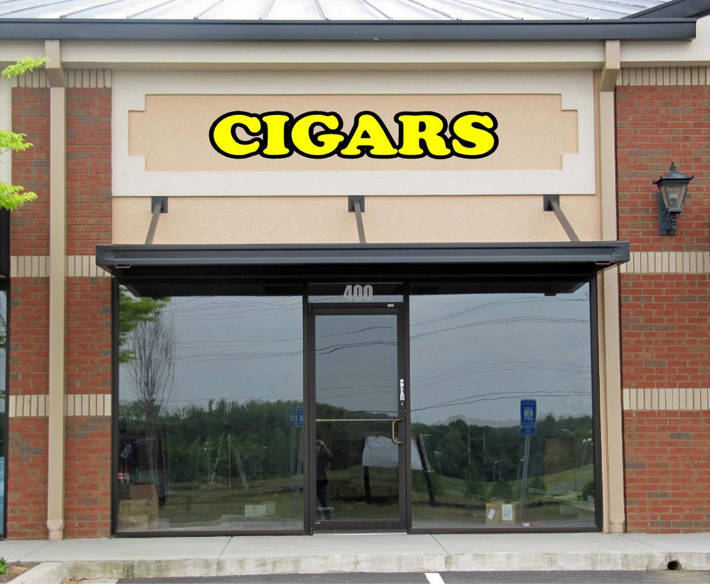 storefront with a mockup of a sign that says Cigars